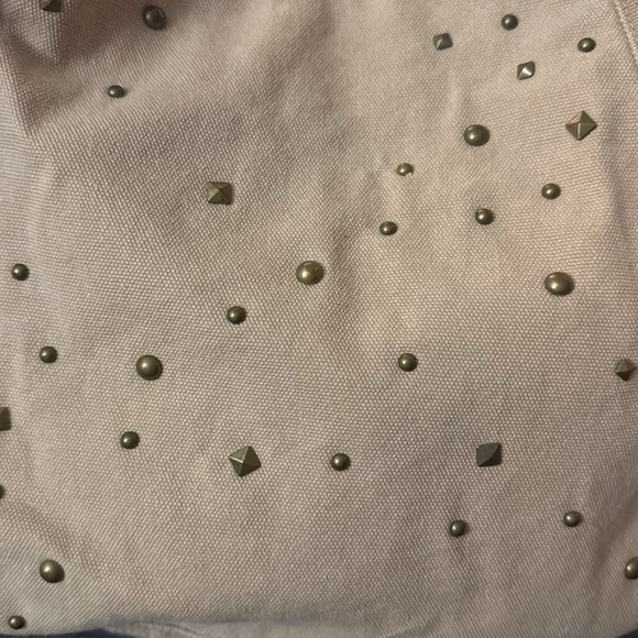 A tan/khaki shoulder bag. - Picture 2 of 5